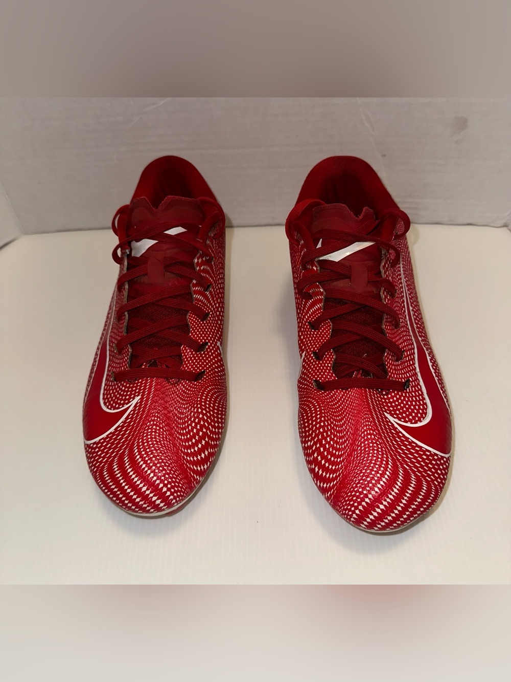 Nike Men's Red Athletic Cleats with White Swoosh